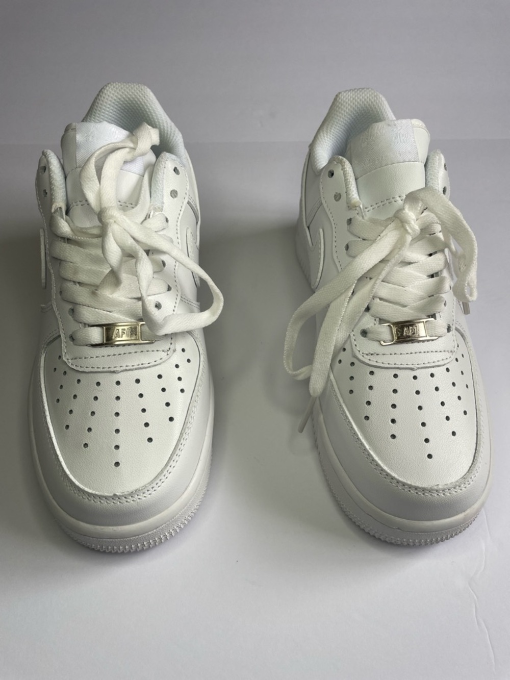 Nike Women’s White Leather Sneakers